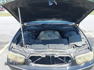 2005 BMW 7 Series 745Li with VIN WBAGN63545DS59212, listed as a IAAI auction lot 42510606 with 124,395 mi miles and . Bid and sale history available at DreamBid. Image 10.