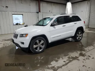 2014 Jeep Grand Cherokee Limited with VIN 1C4RJFBG1EC140601, listed as a Copart auction lot 56298305 with 131,193 mi miles and Salvage title. Bid and sale history available at DreamBid. Image 1.