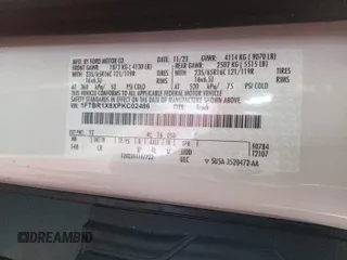 2023 Ford Transit Cargo z VIN 1FTBR1X8XPKC02486, wystawiony jako IAAI lot #42786968 z przebiegiem 7 229 mil mil oraz . Historia ofert i sprzedaży dostępna na DreamBid. Obrazek 18.