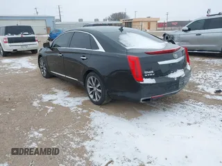 2013 Cadillac XTS Luxury with VIN 2G61R5S30D9100094, listed as a IAAI auction lot 41601711 with 191,068 mi miles and . Bid and sale history available at DreamBid. Image 3.