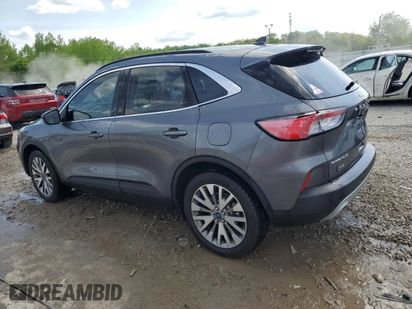 2021 Ford Escape Titanium Hybrid z VIN 1FMCU9DZ4MUA56645, wystawiony jako Copart lot #54059515 z przebiegiem 31 432 mil mil oraz Szkoda całkowita • Salvage title. Historia ofert i sprzedaży dostępna na DreamBid. Obrazek 2.
