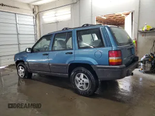 1994 Jeep Grand Cherokee Laredo with VIN 1J4FX58S0RC316030, listed as a Copart auction lot 66178754 with 281,785 mi miles and Salvage Title. Bid and sale history available at carsss.com. Image 2.
