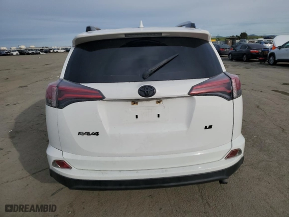 2016 Toyota RAV4 LE with VIN JTMZFREV4GJ061421, listed as a Copart auction lot 45666435 with 117,730 mi miles and Salvage Title. Bid and sale history available at carsss.com. Image 6.