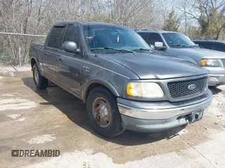 2003 Ford F-150 XLT with VIN 1FTRW076X3KA76379, listed as a IAAI auction lot 41821131 with 221,081 mi miles. Bid and sale history available at carsss.com. Image 1.