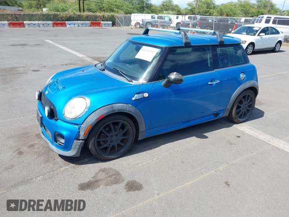 2008 MINI Hardtop S with VIN WMWMF73518TT86953, listed as a IAAI auction lot 42239292 with 107,513 mi miles and . Bid and sale history available at DreamBid. Image 2.