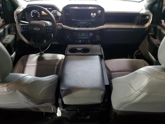 2022 Ford F-150 XL with VIN 1FTFW1E57NKD28966, listed as a Copart auction lot 55878125 with 77,121 mi miles and Salvage title. Bid and sale history available at DreamBid. Image 8.