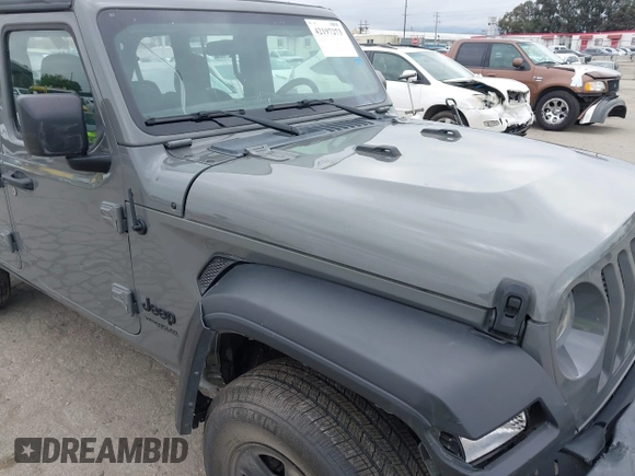 2022 Jeep Wrangler Unlimited Sport S with VIN 1C4HJXDG8NW126143, listed as a IAAI auction lot 42197273 with 44,472 mi miles and . Bid and sale history available at DreamBid. Image 6.