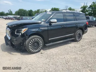 2021 Lincoln Navigator Black Label with VIN 5LMJJ2TT6MEL03658, listed as a Copart auction lot 61263614 with 59,472 mi miles and Salvage Title. Bid and sale history available at carsss.com. Image 1.