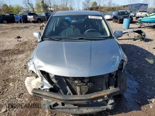 2010 Nissan Versa 1.8 S with VIN 3N1BC1CP9AL468234, listed as a Copart auction lot 52142665 with 127,396 mi miles and Salvage Title. Bid and sale history available at carsss.com. Image 5.