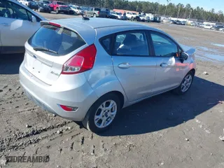 2016 Ford Fiesta SE with VIN 3FADP4EJ2GM150551, listed as a IAAI auction lot 41329285 with 136,305 mi miles. Bid and sale history available at carsss.com. Image 4.
