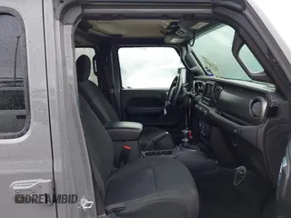2023 Jeep Gladiator Sport S z VIN 1C6HJTAG3PL523140, wystawiony jako IAAI lot #41719004 z przebiegiem 34 014 mil mil oraz . Historia ofert i sprzedaży dostępna na DreamBid. Obrazek 5.