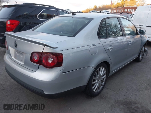 2009 Volkswagen Jetta Wolfsburg Edition with VIN 3VWRJ71K19M027857, listed as a IAAI auction lot 41312413 with 150,335 mi miles and . Bid and sale history available at DreamBid. Image 4.