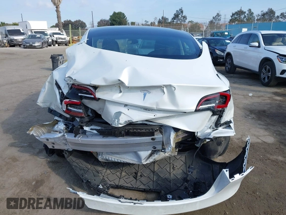 2022 Tesla Model 3 with VIN 5YJ3E1EA1NF167711, listed as a IAAI auction lot 41594266 with 50,554 mi miles and . Bid and sale history available at DreamBid. Image 16.