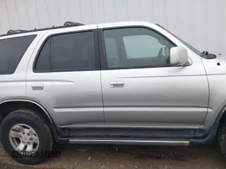 1999 Toyota 4Runner SR5 with VIN JT3HN86RXX0232435, listed as a IAAI auction lot 41473618 with 267,054 mi miles and . Bid and sale history available at DreamBid. Image 14.