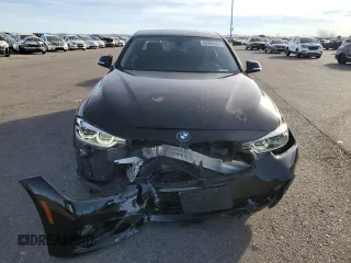 2018 BMW 3 Series 320i with VIN WBA8A9C51JAD27692, listed as a Copart auction lot 80269094 with 67,429 mi miles and Salvage Title. Bid and sale history available at carsss.com. Image 5.