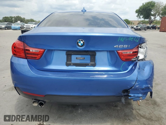 2014 BMW 4 Series 428i with VIN WBA3N3C51EK230632, listed as a Copart auction lot 56192095 with 115,595 mi miles and Salvage title. Bid and sale history available at DreamBid. Image 6.