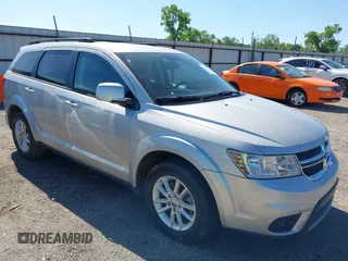 2014 Dodge Journey SXT with VIN 3C4PDCBG8ET118998, listed as a IAAI auction lot 42177885 with 165,247 mi miles. Bid and sale history available at carsss.com. Image 1.