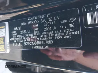 2021 Kia Forte FE with VIN 3KPF24AD1ME407089, listed as a IAAI auction lot 41707743 with 34,411 mi miles. Bid and sale history available at carsss.com. Image 9.