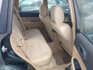 2003 Subaru Forester X z VIN JF1SG63683H738938, wystawiony jako IAAI lot #42341488 z przebiegiem 139 733 mil mil oraz . Historia ofert i sprzedaży dostępna na DreamBid. Obrazek 8.