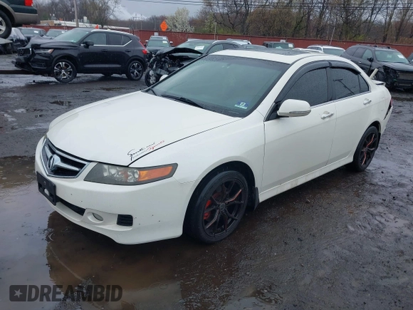 2007 Acura TSX Navi with VIN JH4CL96987C010023, listed as a IAAI auction lot 42026153 with 225,003 mi miles and . Bid and sale history available at DreamBid. Image 2.