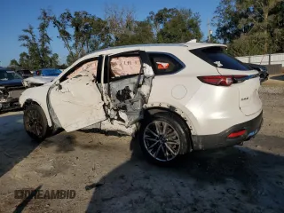 2016 Mazda CX-9 Grand Touring with VIN JM3TCADY3G0122945, listed as a Copart auction lot 87018034 with Not Provided miles and Salvage Title. Bid and sale history available at DreamBid. Image 2.