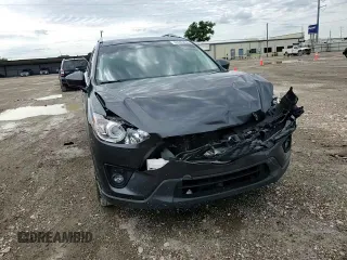2014 Mazda CX-5 Touring z VIN JM3KE2CY7E0308580, wystawiony jako Copart lot #60565835 z przebiegiem 92 708 mil mil oraz Szkoda całkowita • Salvage title. Historia ofert i sprzedaży dostępna na DreamBid. Obrazek 14.