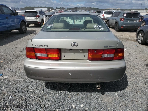 1997 Lexus ES 300 Luxury Sport Sdn with VIN JT8BF22G0V0057835, listed as a Copart auction lot 74487294 with 158,296 mi miles and Salvage Title. Bid and sale history available at carsss.com. Image 6.