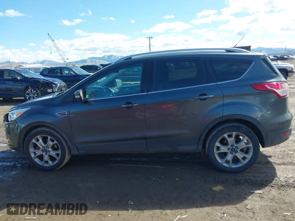 2016 Ford Escape Titanium with VIN 1FMCU9J96GUB96009, listed as a IAAI auction lot 41866127 with 132,990 mi miles and . Bid and sale history available at DreamBid. Image 15.