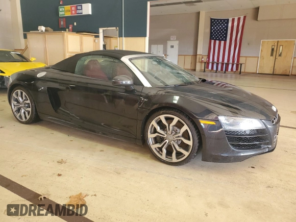 2011 Audi R8 z VIN WUATNAFG7BN002863, wystawiony jako Copart lot #87601245 z przebiegiem Nie podano mil oraz Tytuł czysty. Historia ofert i sprzedaży dostępna na DreamBid. Obrazek 4.