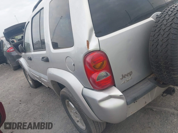 2003 Jeep Liberty Limited z VIN 1J8GL58K23W726252, wystawiony jako IAAI lot #42035004 z przebiegiem 224 159 mil mil oraz . Historia ofert i sprzedaży dostępna na DreamBid. Obrazek 13.