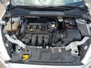 2018 Ford Focus SE z VIN 1FADP3F25JL272797, wystawiony jako Copart lot #54626215 z przebiegiem 116 679 mil mil oraz Szkoda całkowita • Salvage title. Historia ofert i sprzedaży dostępna na DreamBid. Obrazek 11.
