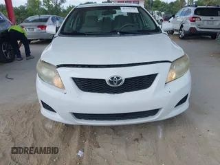 2010 Toyota Corolla with VIN 1NXBU4EE0AZ335239, listed as a IAAI auction lot 42155710 with 215,134 mi miles. Bid and sale history available at carsss.com. Image 6.
