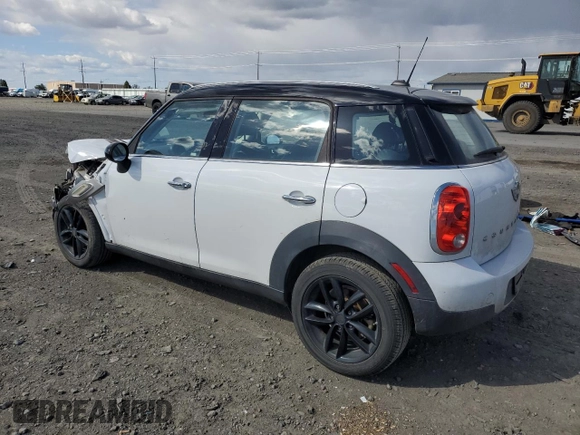 2015 MINI Countryman with VIN WMWZB3C50FWR44801, listed as a Copart auction lot 51957715 with 69,537 mi miles and Salvage Title. Bid and sale history available at DreamBid. Image 2.