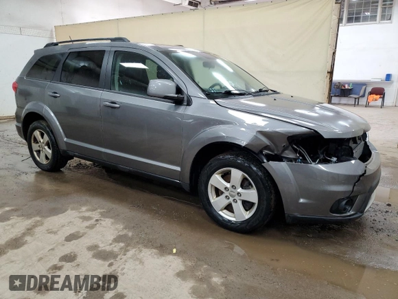 2012 Dodge Journey SXT with VIN 3C4PDCBG1CT353210, listed as a Copart auction lot 48863415 with 122,904 mi miles and Clean title. Bid and sale history available at DreamBid. Image 4.