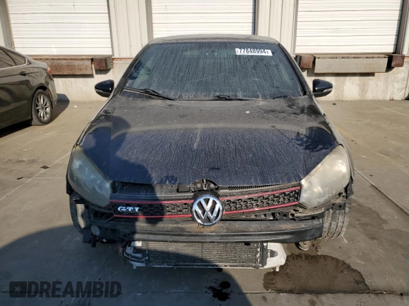 2010 Volkswagen GTI w/Sunroof with VIN WVWEV7AJ9AW329267, listed as a Copart auction lot 77848994 with 0 mi miles and Salvage Title. Bid and sale history available at carsss.com. Image 5.