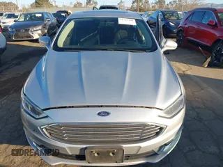 2017 Ford Fusion Hybrid Titanium with VIN 3FA6P0RU8HR190482, listed as a IAAI auction lot 41322244 with 137,539 mi miles and . Bid and sale history available at DreamBid. Image 12.