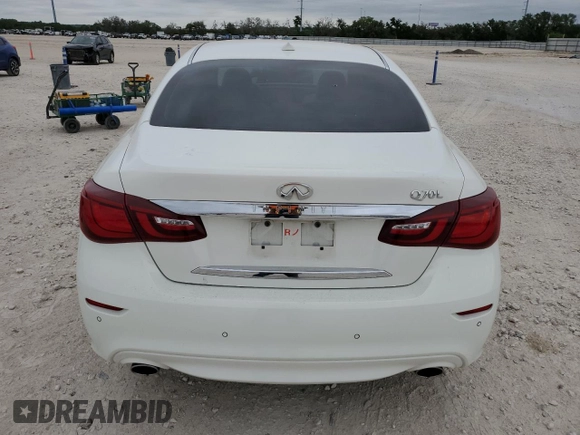 2015 Infiniti Q70 z VIN JN1BY1PP2FM601201, wystawiony jako Copart lot #53235845 z przebiegiem 62 556 mil mil oraz Szkoda całkowita • Salvage title. Historia ofert i sprzedaży dostępna na DreamBid. Obrazek 6.
