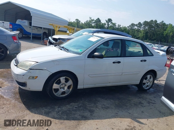 2005 Ford Focus S with VIN 1FAHP34N45W230950, listed as a IAAI auction lot 42467778 with 203,697 mi miles and . Bid and sale history available at DreamBid. Image 14.