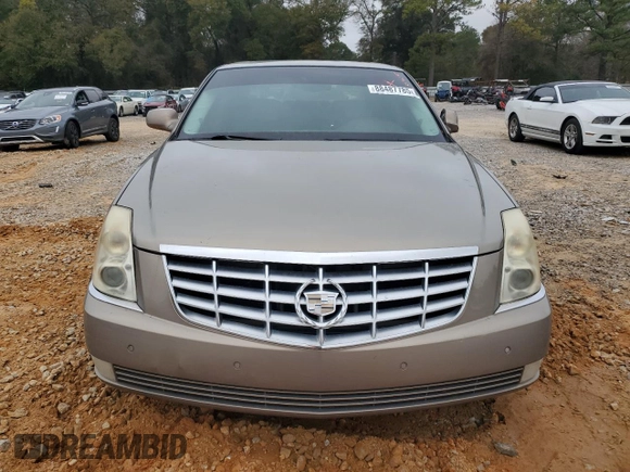 2007 Cadillac DTS V8 z VIN 1G6KD57Y47U115566, wystawiony jako Copart lot #88487785 z przebiegiem 93 484 mil mil oraz Szkoda całkowita • Salvage title. Historia ofert i sprzedaży dostępna na DreamBid. Obrazek 5.