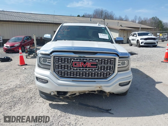 2017 GMC Sierra 1500 Denali with VIN 3GTU2PEC5HG164021, listed as a IAAI auction lot 41784101 with 69,167 mi miles and . Bid and sale history available at DreamBid. Image 13.