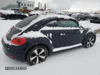 2012 Volkswagen Beetle 2.5L with VIN 3VWJX7AT9CM612892, listed as a Copart auction lot 48059405 with 106,416 mi miles and Salvage Title. Bid and sale history available at carsss.com. Image 3.