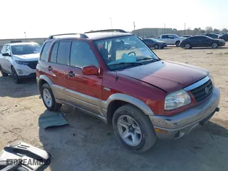2002 Suzuki Grand Vitara JLX with VIN JS3TD62V824152943, listed as a IAAI auction lot 41668395 with 104,191 mi miles. Bid and sale history available at carsss.com. Image 1.