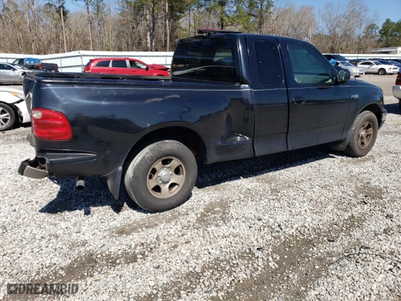 2002 Ford F-150 XL with VIN 1FTRX07252KC90074, listed as a Copart auction lot 48565215 with 0 mi miles and Salvage Title. Bid and sale history available at carsss.com. Image 3.