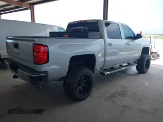 2017 Chevrolet Silverado 1500 LT with VIN 3GCPCRECXHG432552, listed as a IAAI auction lot 42052078 with 67,221 mi miles. Bid and sale history available at carsss.com. Image 4.