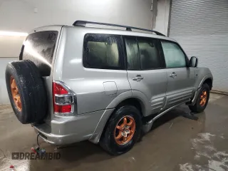 2001 Mitsubishi Montero Limited z VIN JA4MW51R71J038583, wystawiony jako Copart lot #83024384 z przebiegiem 157 538 mil mil oraz Szkoda całkowita • Salvage title. Historia ofert i sprzedaży dostępna na DreamBid. Obrazek 3.