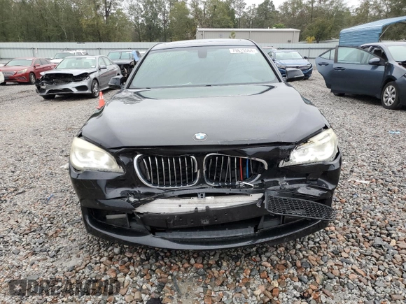 2013 BMW 7 Series 750Li z VIN WBAYE8C53DD131817, wystawiony jako Copart lot #79615564 z przebiegiem 125 737 mil mil oraz Szkoda całkowita • Salvage title. Historia ofert i sprzedaży dostępna na DreamBid. Obrazek 5.