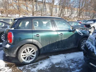 2013 MINI Countryman with VIN WMWZB3C53DWM08700, listed as a IAAI auction lot 41402093 with 71,109 mi miles and . Bid and sale history available at DreamBid. Image 14.
