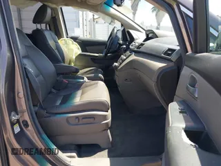 2012 Honda Odyssey Touring with VIN 5FNRL5H98CB011297, listed as a IAAI auction lot 42207061 with 154,073 mi miles and . Bid and sale history available at DreamBid. Image 5.
