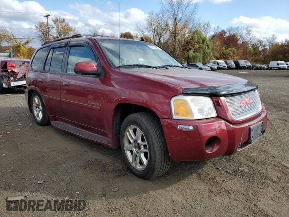 2007 GMC Envoy Denali with VIN 1GKET63M472231291, listed as a Copart auction lot 77020984 with 157,364 mi miles and Salvage Title. Bid and sale history available at DreamBid. Image 4.