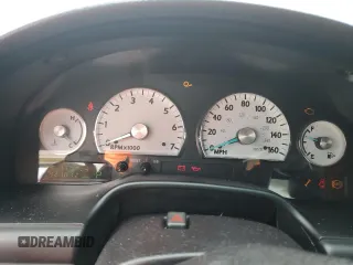 2004 Ford Thunderbird Deluxe with VIN 1FAHP60A44Y111156, listed as a Copart auction lot 79000014 with 42,101 mi miles and Salvage Title. Bid and sale history available at DreamBid. Image 9.